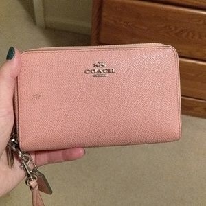 Pink Coach wristlet.